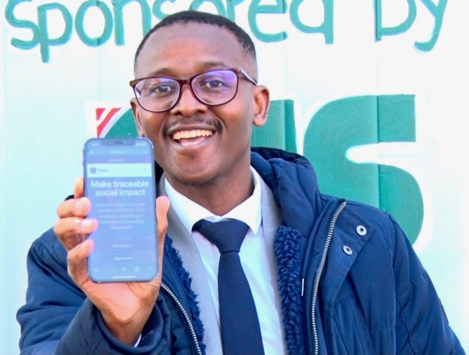 maker holds a phone